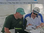 (from left) Tournament Directors Jason Bernhardt and Sean Sauda tally the final scores.