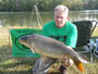 Ed Wagner with his first catch of the tournament, a 22 lb, 3 oz Common. Wagner and Grimley were sponsored by World Classic Baits.