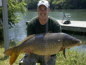 Owner and Club Director Jason Bernhardt with a 32 lbs, 5 oz Common Carp taken in Seneca County,  June 2010