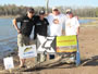 (from left) Paul Dinea, Ioan Iacob and LFSA members and weigh marshals Larry Marler and David Waddell pose at peg 20. Lake Fork, TX