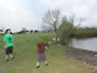 Club Director Scott Ferguson watches young Hendrix cast his line during Session 3 of the Wild Carp Club of Austin.