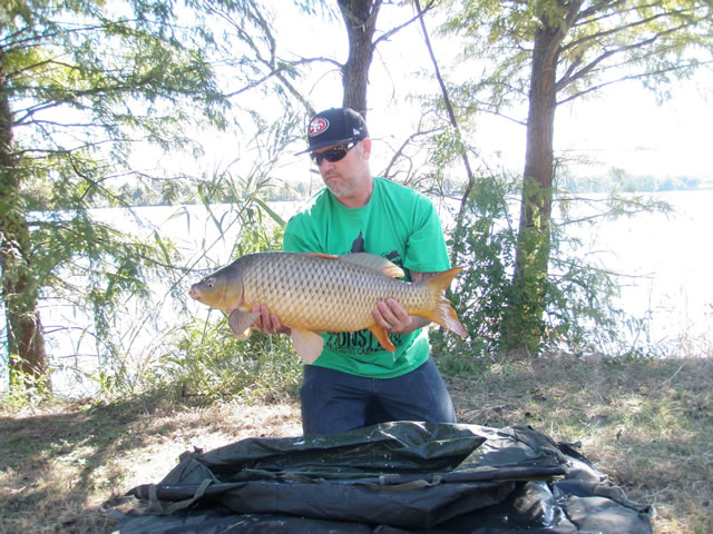 Scott Ferguson with a 21.10 lb common caught during Session 6 of the Wild Carp Club of Austin, TX