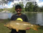 Pat Anderson with a 21.4 lb common carp from Session 2 in Liverpool, NY.