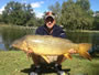 Rick Greenier with a 27.12 lb common carp from Session 2 in Liverpool, NY.