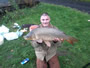 Jamie Godkin with a 16.9 lb common carp caught during Session 3 in Fulton, NY.