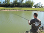 Nick Davis fighting a fish during Session 3 of the Wild Carp Club of Houston.