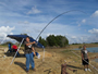 Justin Mary playing a fish during Session 6 of the Wild Carp Club of Houston.