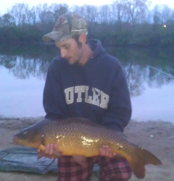 Justin Keaton with the first ever carp caught fr the Wild Carp Club of Indiana--a 14.7 lb common.