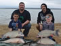 Rick Wilson (top left), Ricky Wilson III (bottom left), Amadeo Jaramillo (top right) and Kaden Jaramillo (bottom right) with quadruple smallmouth buffalo caught during Session 1 of the 2013 season of the Wild Carp Club of North Texas.