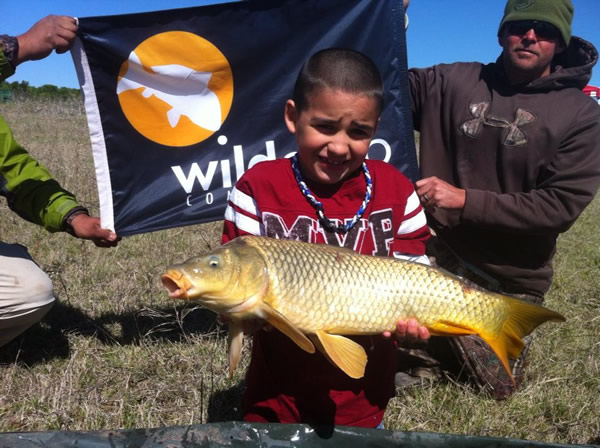 Ricky Wilson III with a 6 lb, 10 oz common caught during session 2 of the 2013 season of the Wild Carp Club of North Texas. Ricky Wilson III with a 6 lb, 10 oz common caught during session 2 of the 2013 season of the Wild Carp Club of North Texas.