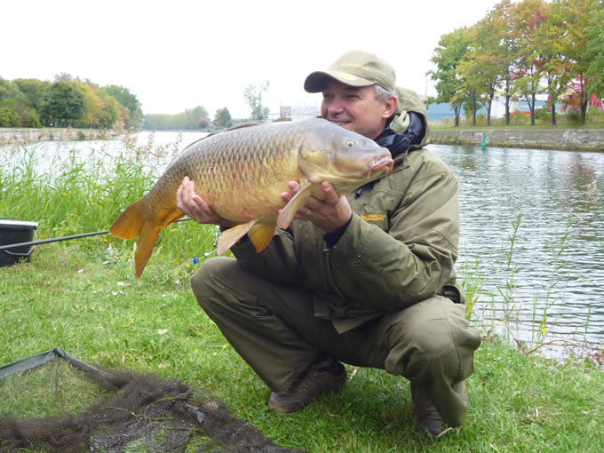 Vali Pavaloaia with a 22.5 lb common carp caught during Session 5--the largest fish of the session