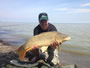 14-Jason Bernhardt with an 18.3 lb common caught during session 1 of the Wild Carp Club of Ontario.