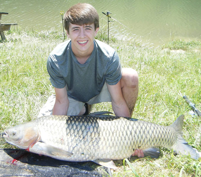 Wyatt Cantrell set a new Wild Carp Club record for largest fish at a club event with his 61 lb, 9 oz grass carp caught during session 5 of the 2013 season of the Wild Carp Club of the Virginias