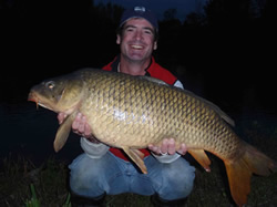 Paul Russell stole 1st place for Big Fish in the 2010 Wild Carp Fall Qualifier--from his teamate Sean Lehrer--with this 24 lb, 14 oz Common caught at 656 PM of day 2, about 30 minutes from conclusion of the event.