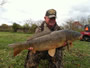 Tom Brooks with the first 20+ lb carp of the Qualifier (20.13).