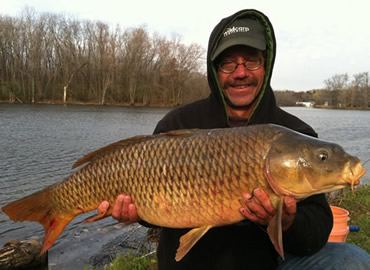 Bill Markle with a 23 lb, 0 oz common carp caught during the November 12, 2011 Shootout in Liverpool, NY
