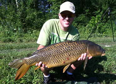 Matt Broekhuizen with a 16 lb, 5 oz common carp caught during the July 30, 2011 Shootout in Baldwinsville, NY