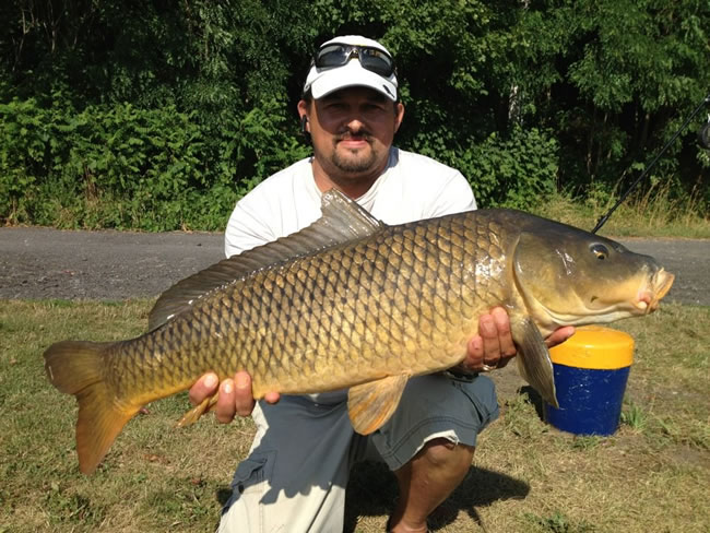 Tamas Vegvari with a 17.1 lb common from the July 8 CNY Summer Shootout in Fulton, NY