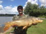 Pat Anderson with a 18.15 lb common caught during hour 4 of the Shootout