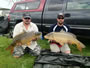 (from left) Jason Long with a 18.13 lb mirror carp and teammate Dan Kelsey with a 27+ lb common carp from the 2012 Wild Carp Classic in Baldwinsville, NY, USA