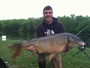 Scottie Criswell of Arkansas poses with a 36 lb, 4 oz common carp caught during the 2012 Wild Carp Classic tournament in Baldwinsville, NY