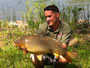 Marcin Szydlowski with a 18.12 lb common at the '12 Wild Carp Classic in Baldwinsville, NY, USA.