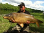 Tamas Vegvari with a 30.10 lb common from hour 7 of the Big Carp Challenge.