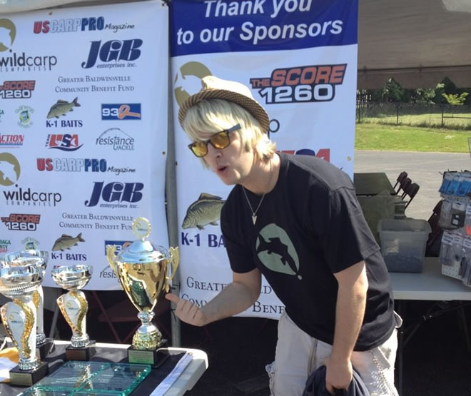 JGB Celebrity Carp Challenge competitor Wade Live poses with the 2012 Wild Carp Week trophies