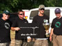 (from left) Tournament Director Jason Bernhardt, Angler Chris Jackson, Angler Scott Russell and Tournament Director Sean Sauda congratulate Russell for his victory as the 2012 Wild Carp Week Triathlon champion.