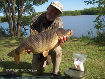 Club Director Gilbert Huxley with a common carp caught in IN