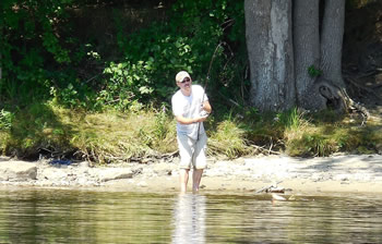 Club Director Joshua Leach fighting a fish.