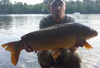 Joshua Leach with a 15 lb Mirror Carp