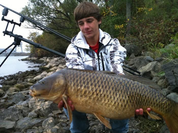 Club Director Michael Cummings with a common carp caught from the St. Lawrence River in Upstate NY