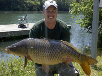 Jason Bernhardt with a 32 lb Common Carp