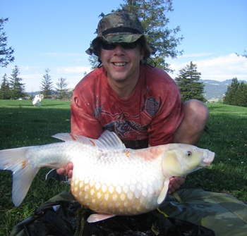 Keith Thompson with a 23lb, 10oz Koi caught at Roberts Lake in May 2006