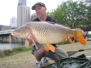 Scott Ferguson with a 34 lb, 8 oz common carp