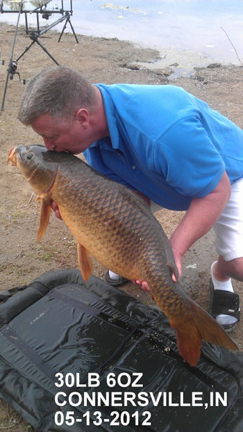 Tony Stout with a 30+ lb common carp caught in Connersville, IN