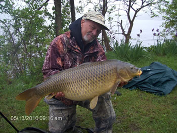 Wild Carp Club of Indiana Director Gilbert Huxley with another fine common carp