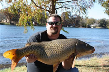 Wild Carp Club of North Texas Club Director Rick Wilson with a common carp